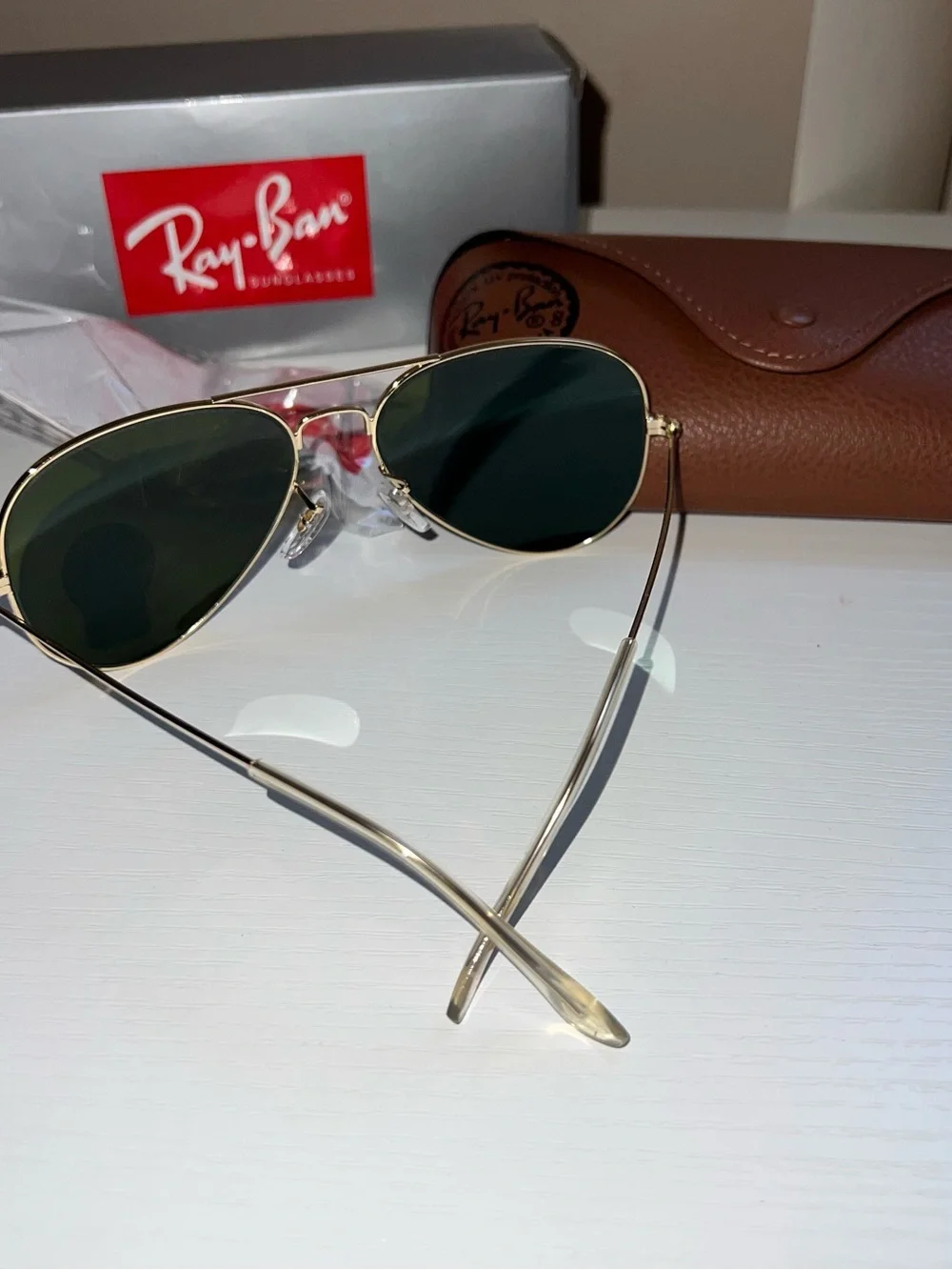 Ray-Ban Gold Frame Sunglasses with Blue Mirrored Lenses